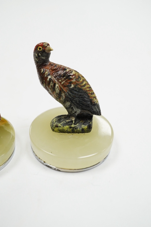 A cased Asprey set of four cold painted bronze and chrome plated novelty game bird menu holders, tallest 5cm high. Condition - good